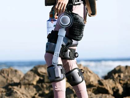 The Ascentz modular exoskeleton attached to a man's knees and hips