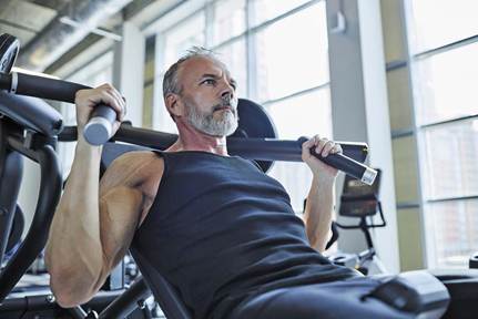 Resistance exercise entails muscles contracting against a force, such as weight on a machine like that pictured.